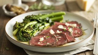Carpaccio of Beef with Parmesan and Sautéed Broccoli Rabe