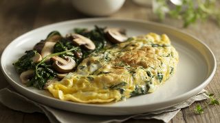 Omelette aux Fines Herbes with Sautéed Spinach and Mushrooms